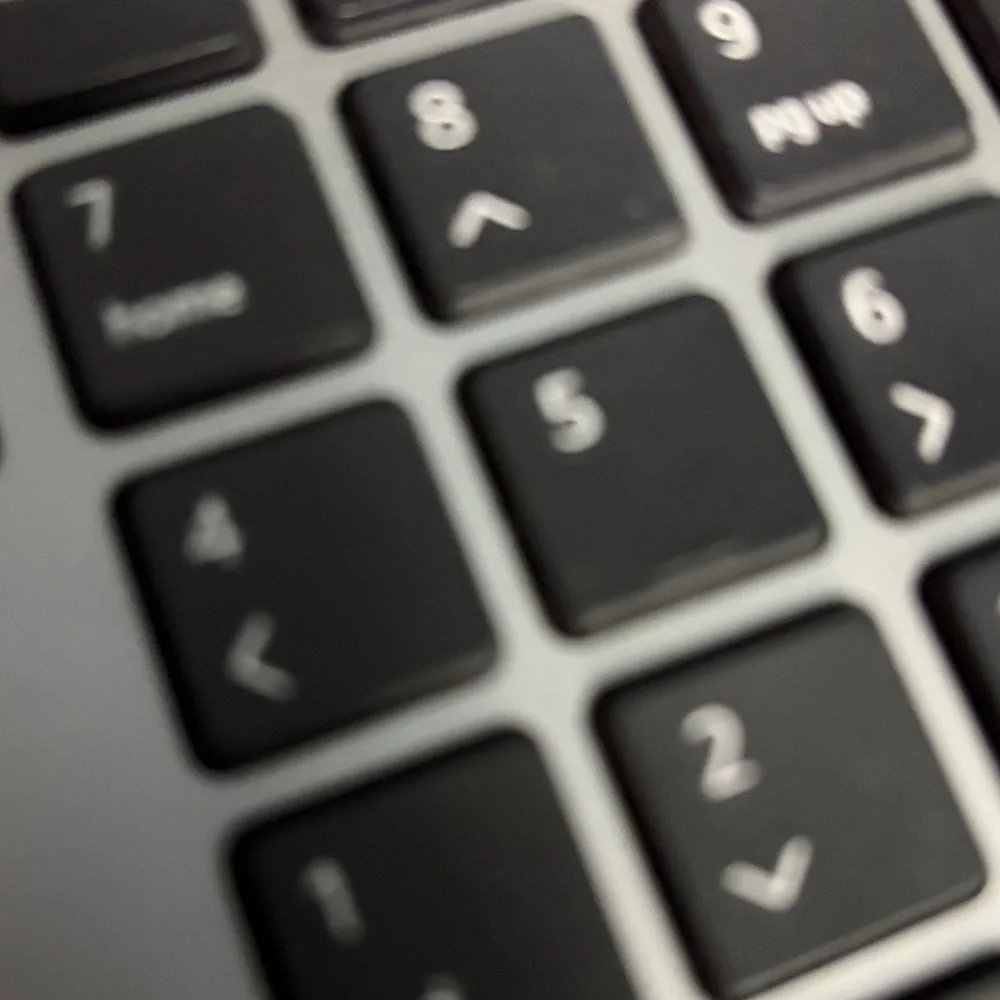 Sleek Black and Silver Laptop Keyboard